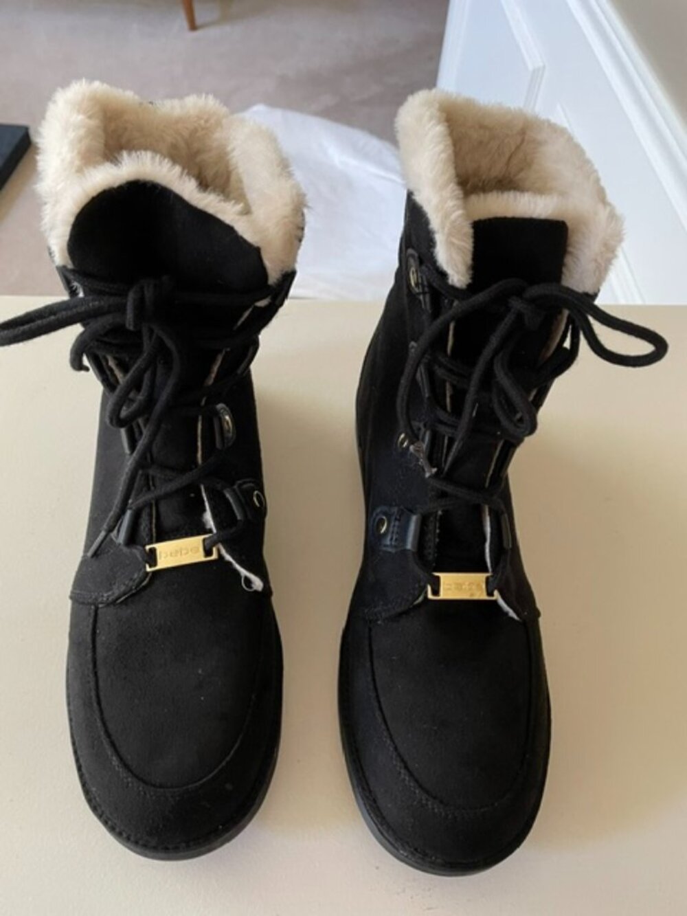 Women's Bebe Comfy Lace up boots in black, size 8.5